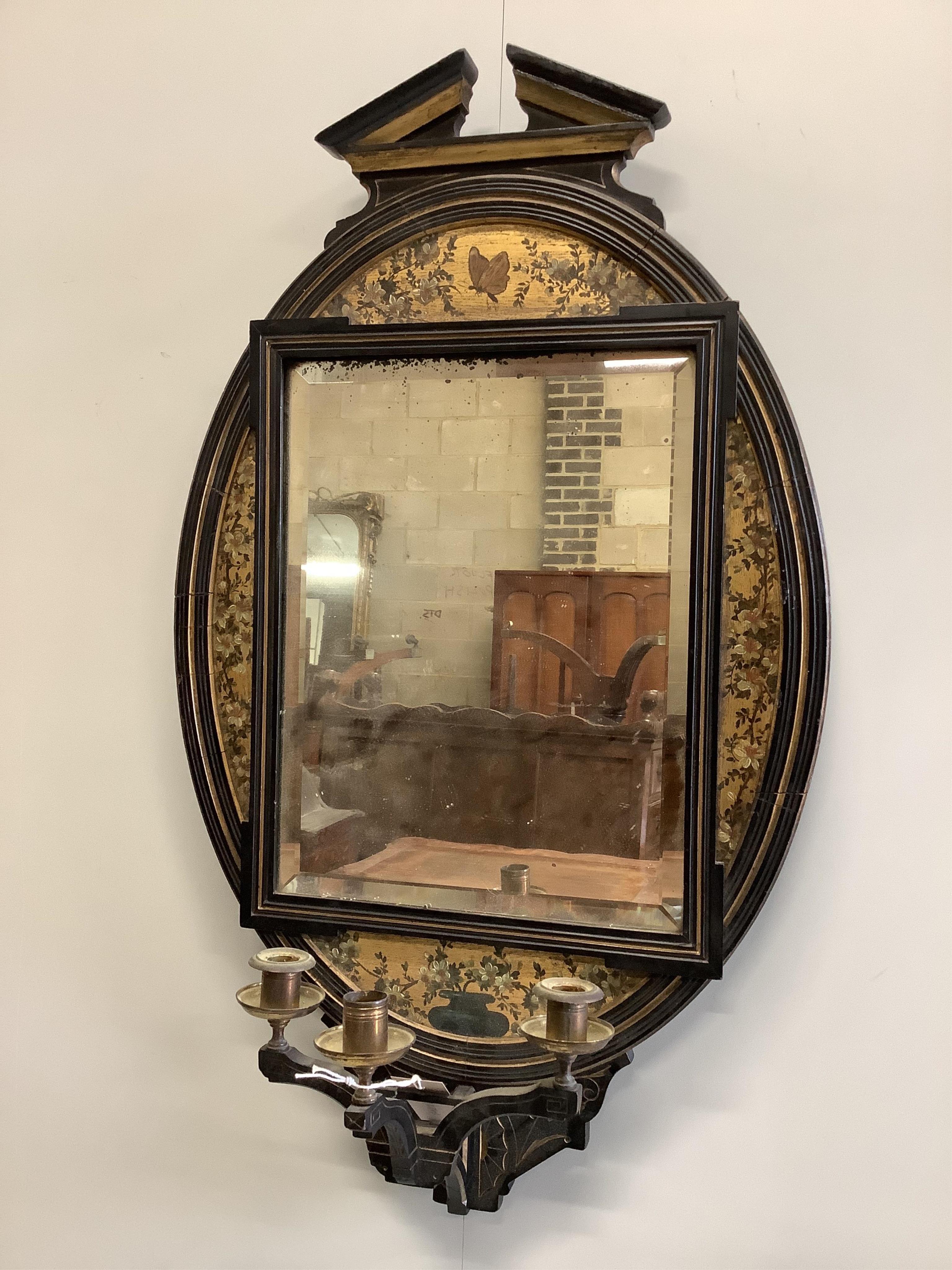 A late Victorian Aesthetic movement girandole by Lamb of Manchester, width 49cm, height 83cm